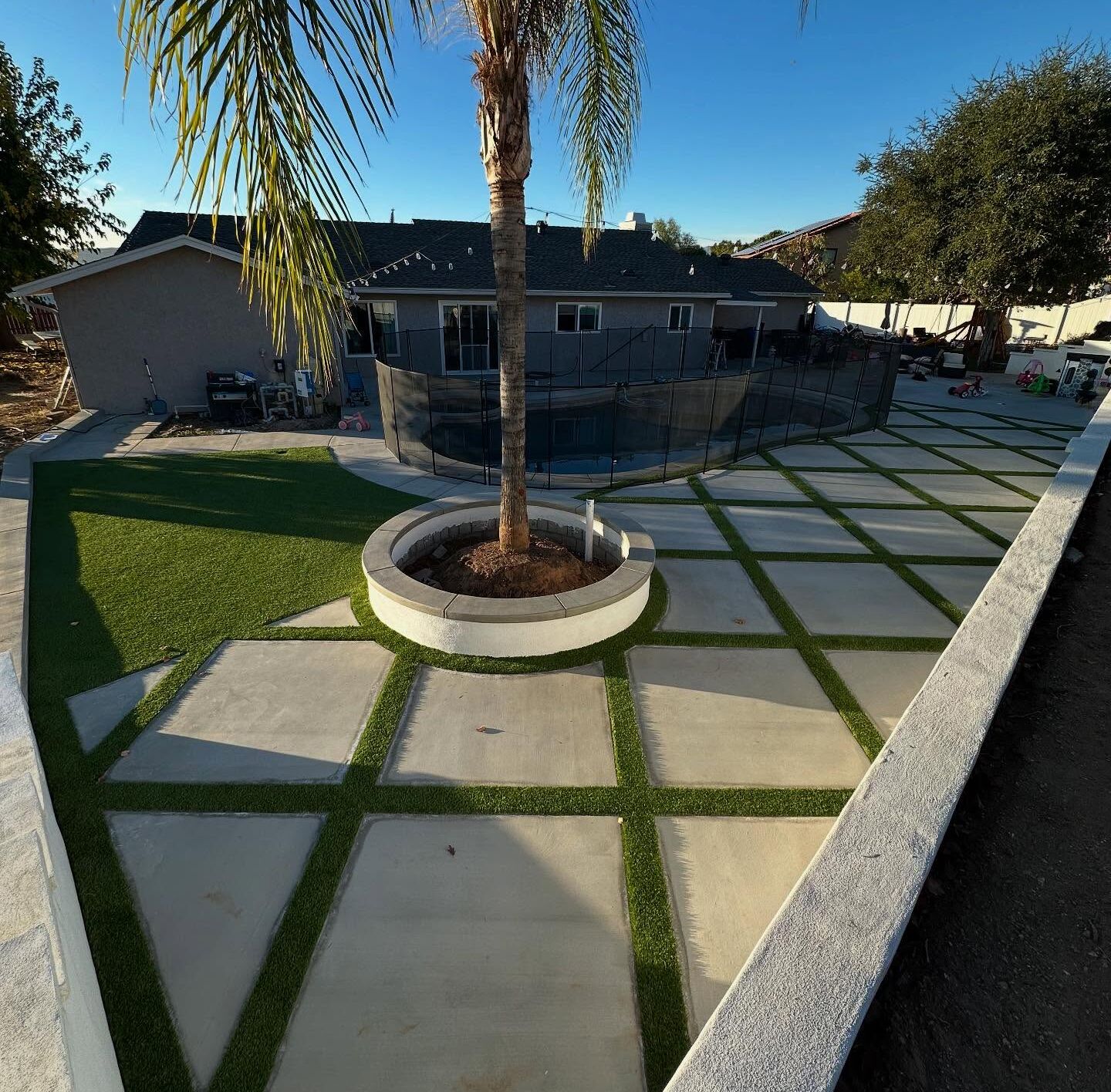 Oak Hills artificial grass Backyard pool deck installation in Yucaipa Artificial Grass Around Pool, Green-R Turf Artificial Grass & Pavers