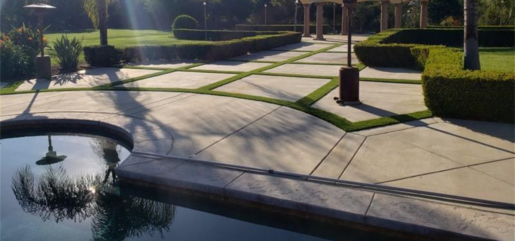 Pool Deck Concrete Pavers and Turf